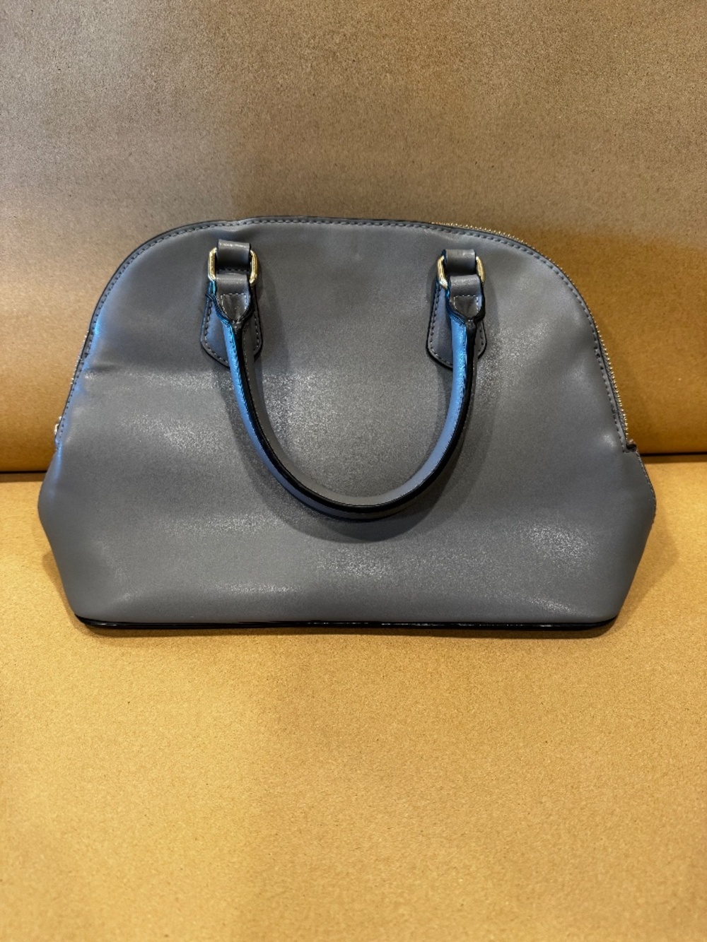 Gray leather hand bag